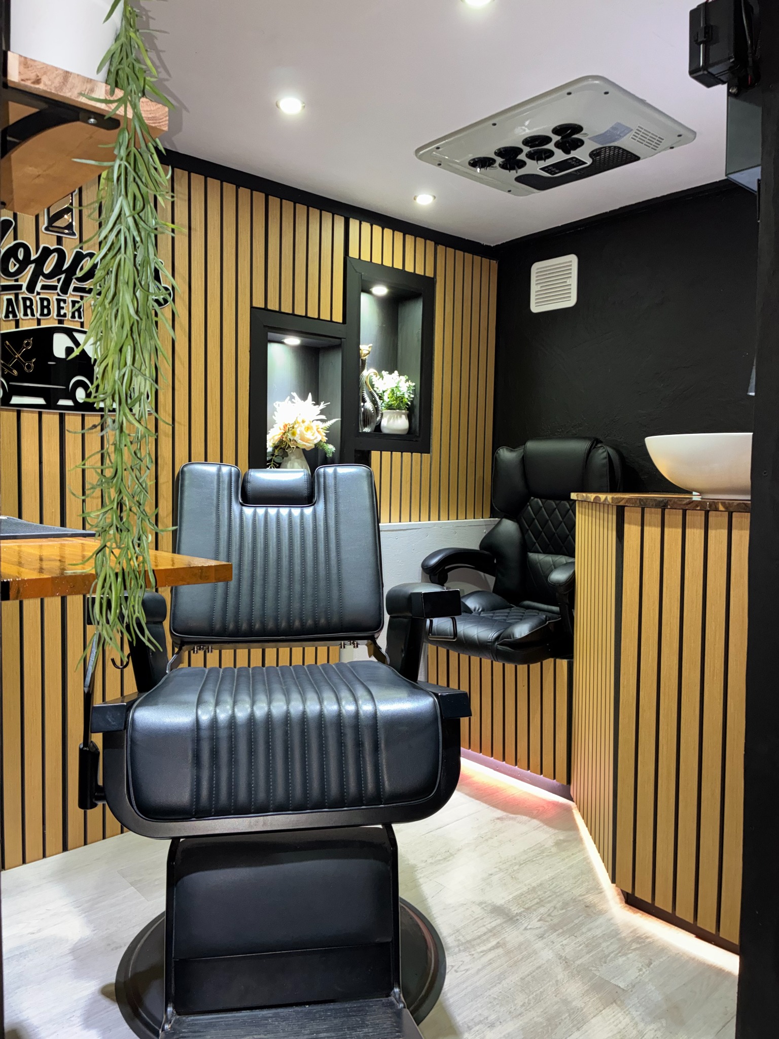 Premium barber chair inside Hoppers Barber Van